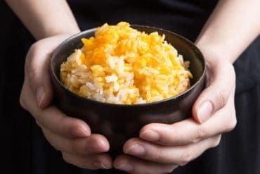 Perfect Kabocha squash pressure cooker rice in less than 30 minutes. This frugal Japanese pumpkin rice is so easy to make. Simple, delicious and healthy. pressurecookrecipes.com