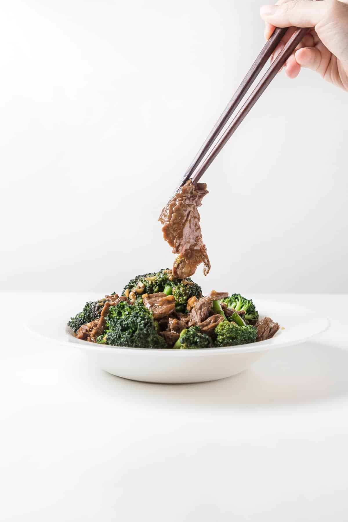 Make this flavorful Chinese Easy Beef and Broccoli Stir Fry recipe in 25 mins! Tender beef & crunchy broccoli soaked in delicious garlicky ginger sauce.