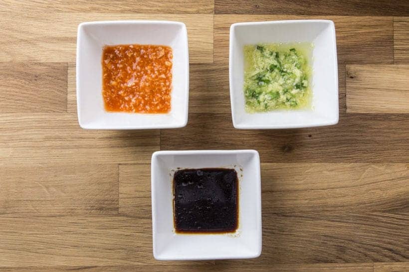 Make this easy Singaporean Hainanese Chicken Rice recipe! Dip the tender & moist Hainanese chicken into flavorful sauces with a spoonful of fragrant “oily rice”. Comforting chicken and rice meal with a homey soup. A simple complete meal with almost zero waste!
