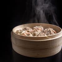 Make this Chinese dim sum Shumai Recipe (燒賣, Siu Mai, Shaomai, or Siomai). Flavorful Pork Dumplings with crunchy shrimps, bouncy pork & fragrant mushrooms. Great make ahead freezer meals!