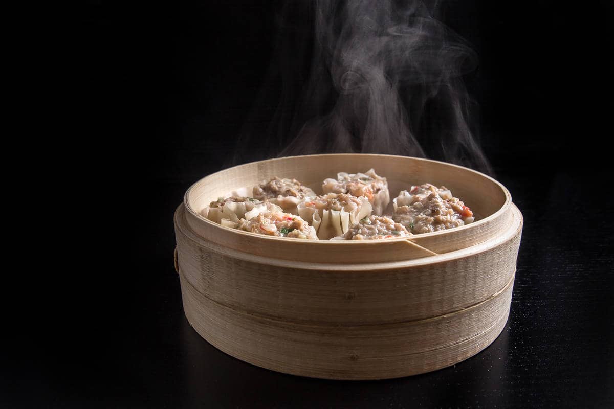 Make this Chinese dim sum Shumai Recipe (燒賣, Siu Mai, Shaomai, or Siomai). Flavorful Pork Dumplings with crunchy shrimps, bouncy pork & fragrant mushrooms. Great make ahead freezer meals!