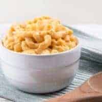 Pressure Cooker Mac and Cheese Recipe: Make this kid-friendly one pot meal in 35 mins! Tender macaroni in smooth, creamy, rich cheddar cheese sauce.