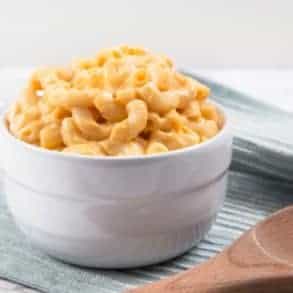 Pressure Cooker Mac and Cheese Recipe: Make this kid-friendly one pot meal in 35 mins! Tender macaroni in smooth, creamy, rich cheddar cheese sauce.