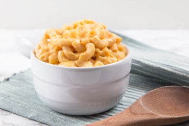 Pressure Cooker Mac and Cheese Recipe: Make this kid-friendly one pot meal in 35 mins! Tender macaroni in smooth, creamy, rich cheddar cheese sauce.