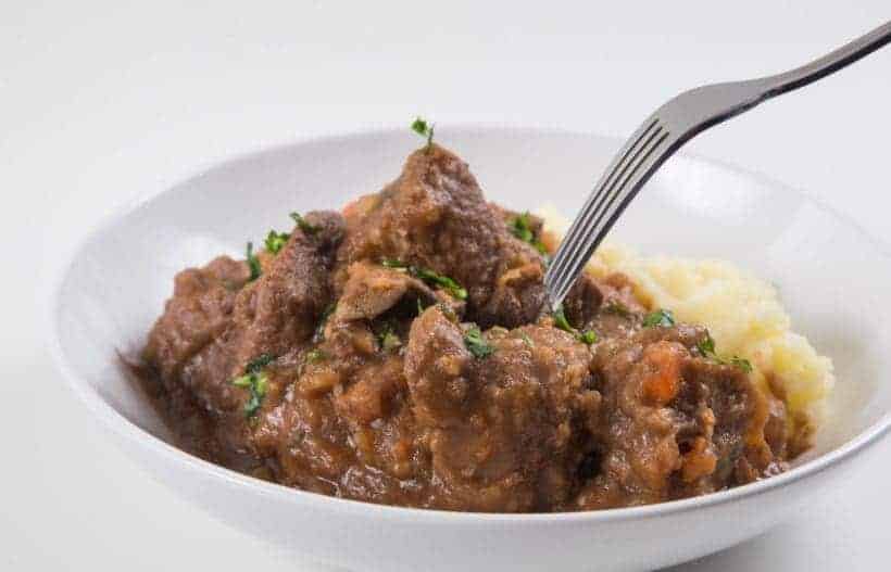 Guinness Instant Pot Irish Beef Stew and Mashed Potatoes Recipe: Celebrate St Patrick's Day with this Pot-in-Pot Pressure Cooker Irish Stew with rich gravy. Delicious adult treat you shouldn't miss!