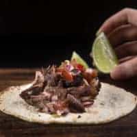 Easy Instant Pot Carnitas Recipe (Pressure Cooker Carnitas): Cut short cooking time and make this crispy and Juicy Mexican Pulled Pork! Perfect with tacos, burritos, or tamales.