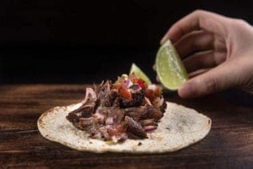 Easy Instant Pot Carnitas Recipe (Pressure Cooker Carnitas): Cut short cooking time and make this crispy and Juicy Mexican Pulled Pork! Perfect with tacos, burritos, or tamales.