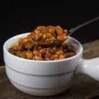 Make Smokey Instant Pot Baked Beans Recipe (Pressure Cooker Baked Beans) Homemade Baked Beans from Scratch in deliciously thick sticky sauce. Perfect for your next BBQ, picnics, potlucks, or dinners.