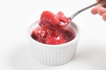 How to make Instant Pot Strawberry Compote Recipe (Pressure Cooker Strawberry Compote): Luscious Sweet 6-ingredient Strawberry Sauce will have you licking your spoons. Great topping for cheesecake or breakfast.