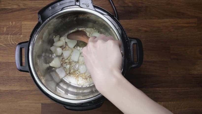 saute chopped onions and minced garlic cloves