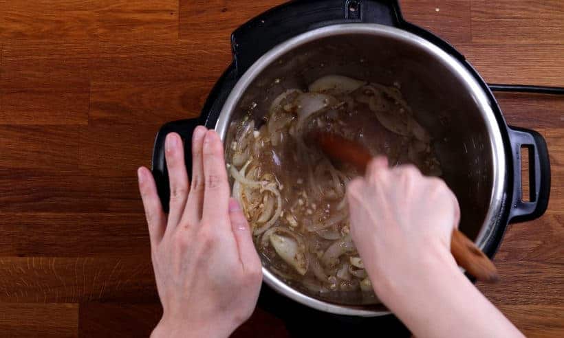 deglaze Instant Pot Pressure Cooker with wooden spoon  #AmyJacky #InstantPot #PressureCooker #recipe 