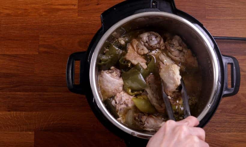 instant pot chili verde: remove chicken thighs from Instant Pot    #AmyJacky #InstantPot #PressureCooker #recipe #mexican #chicken