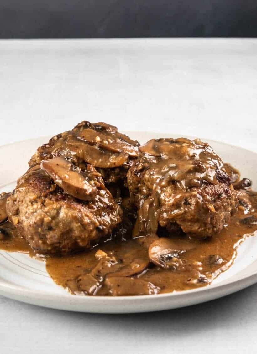 https://www.pressurecookrecipes.com/wp-content/uploads/2020/11/pressure-cooker-salisbury-steak-820x1131.jpg