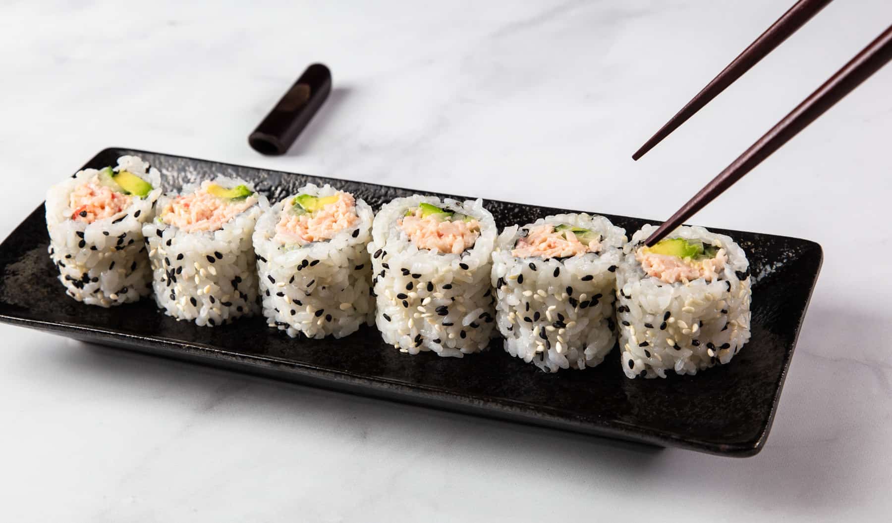 How roll sushi with bamboo mat (California Roll) 